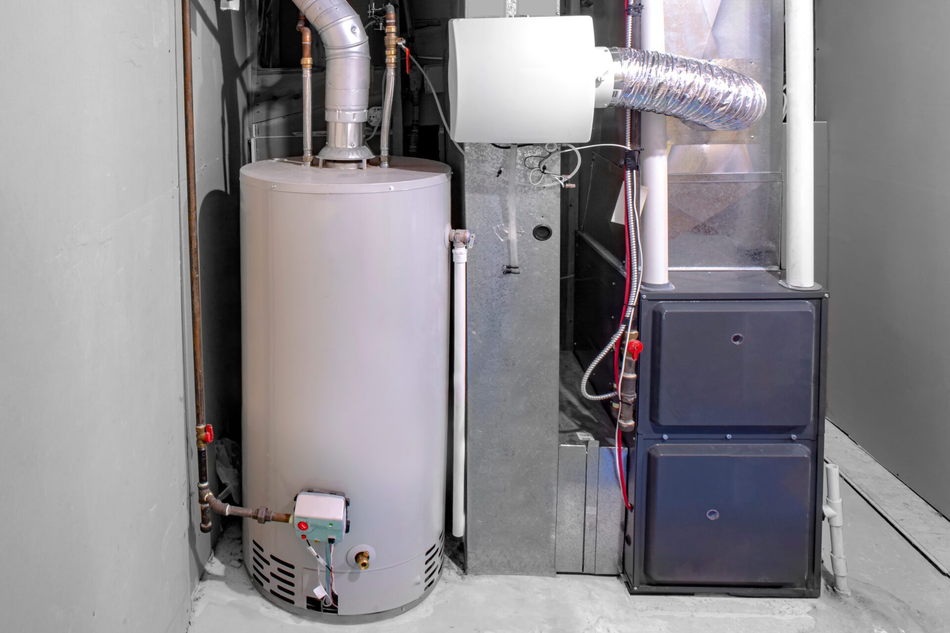A home high efficiency furnace with a residential gas water heater & humidifier. A home high efficiency furnace with a residential gas water heater & humidifier.