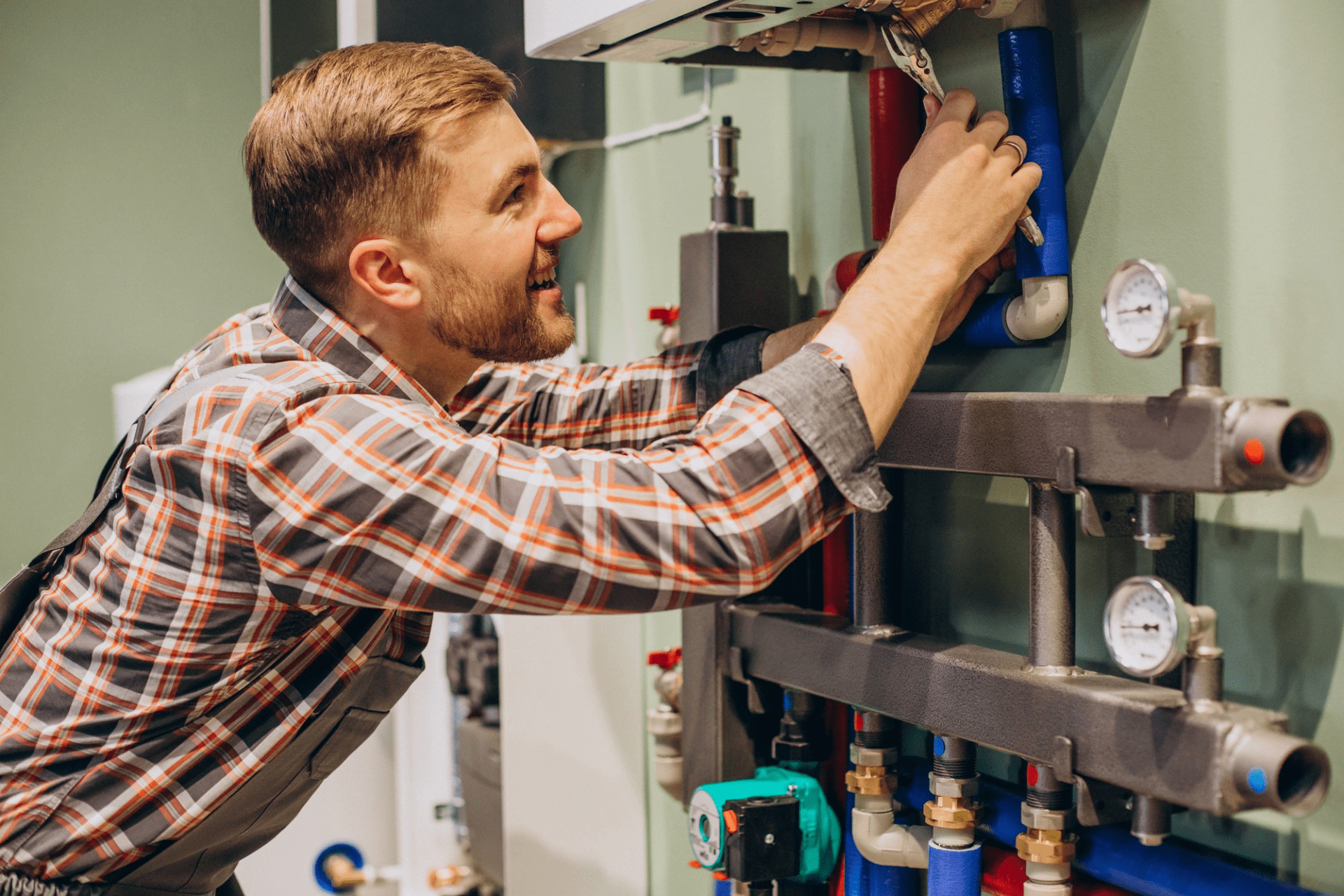 young engineer adjusting autonomous heating young engineer adjusting autonomous heating